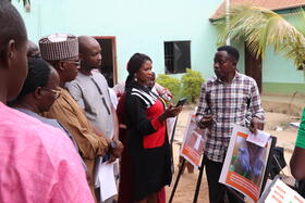 Participant explaining his lived experience through a photo